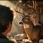 photo realistic image of a trophy whitetail deer on a trail camera for Best Cellular Trail Cameras for 2026 The Ultimate Scouting & Security Guide